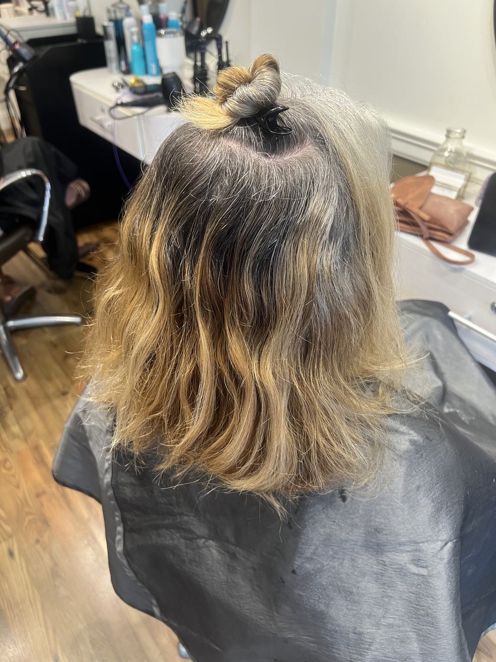 Before: grown-out blonde with silver regrowth, mid-transition