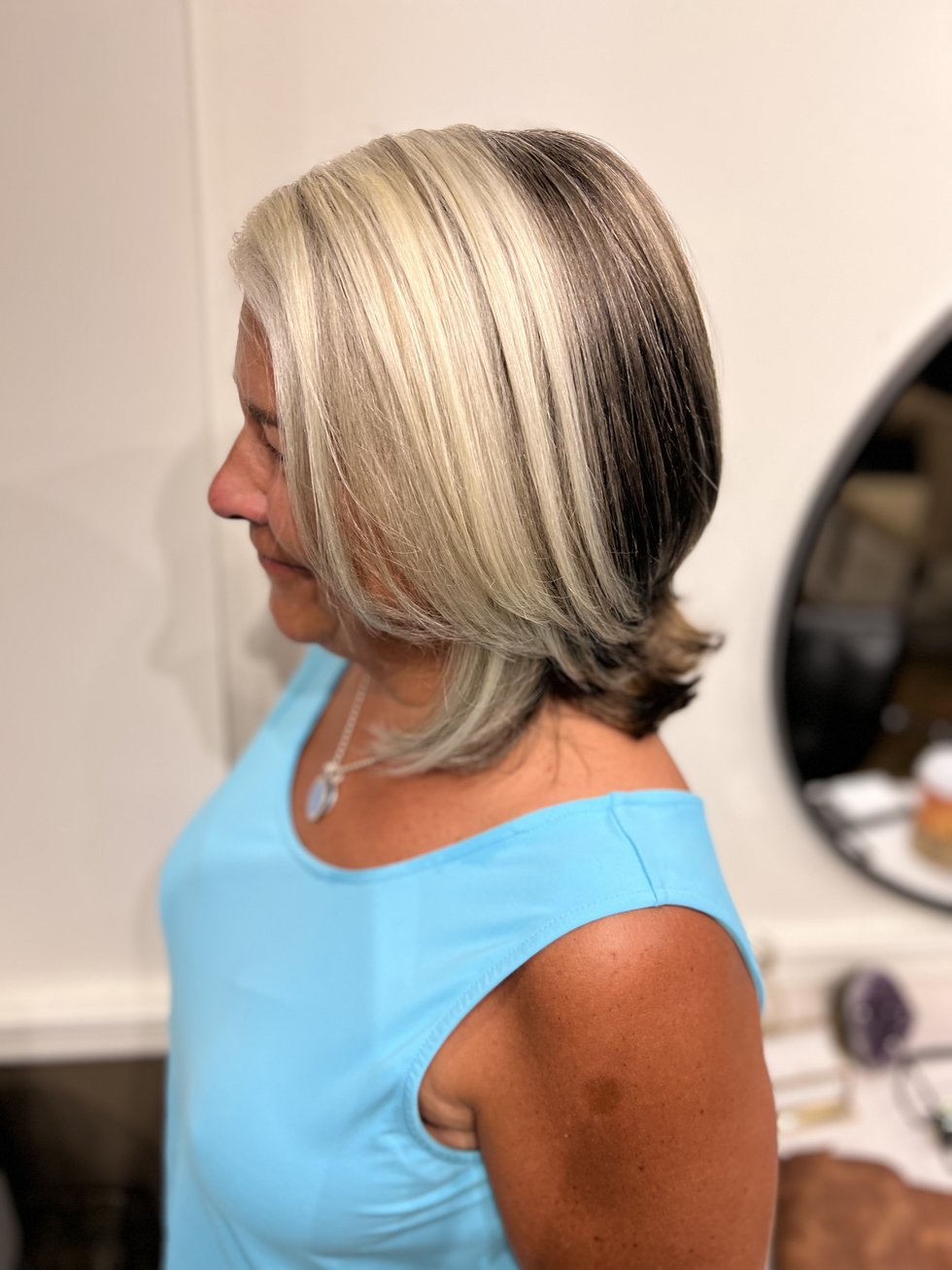 After: completed dimensional silver blend with soft layered bob