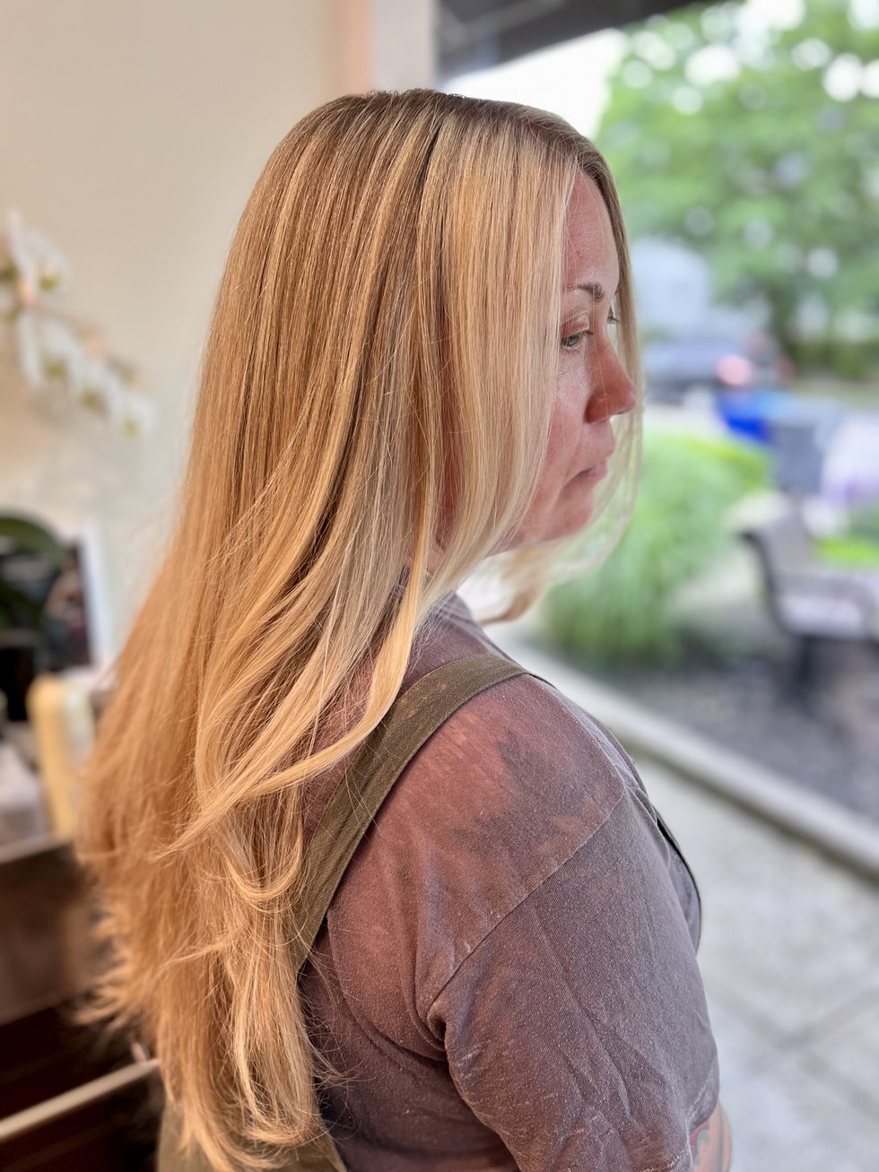 After: restored healthy blonde with rebuilt, glossy ends